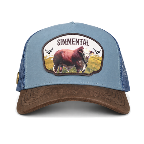 Gorra Ranch & Corral Simmental azul con visera café, vista frontal. SKU 7506552413327.